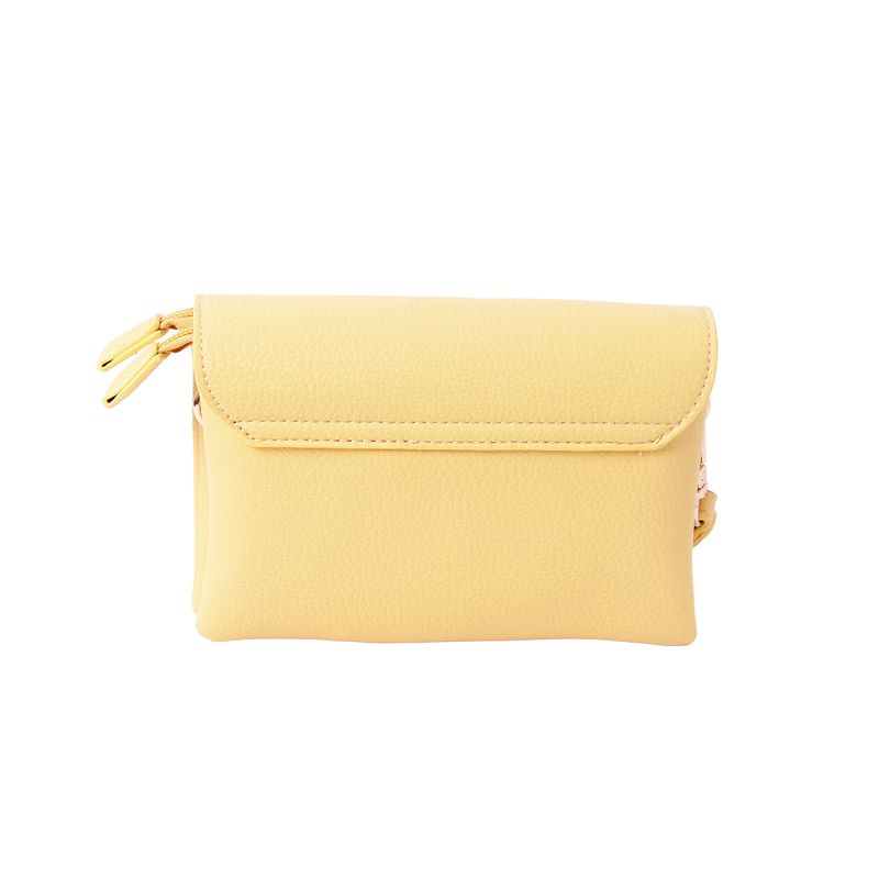 DANIELLE clutch lys gul i imitert skinn