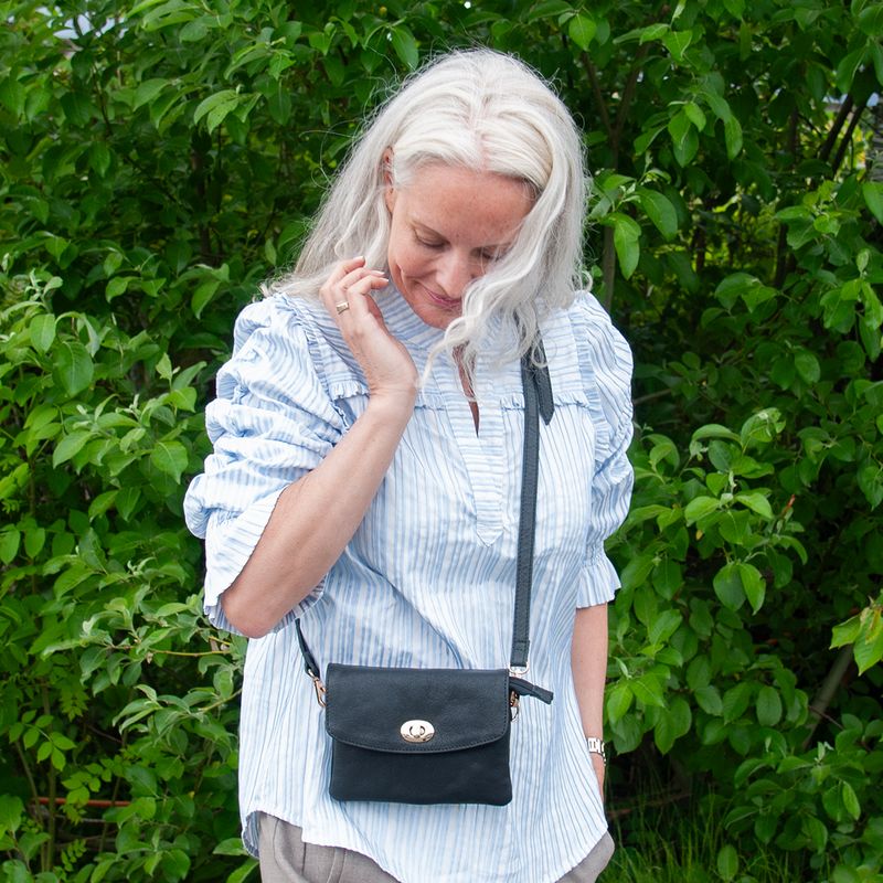 DANIELLA mini clutch i skinn - svart
